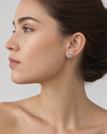 Female model wearing 10K White Gold Diamond Square Earrings