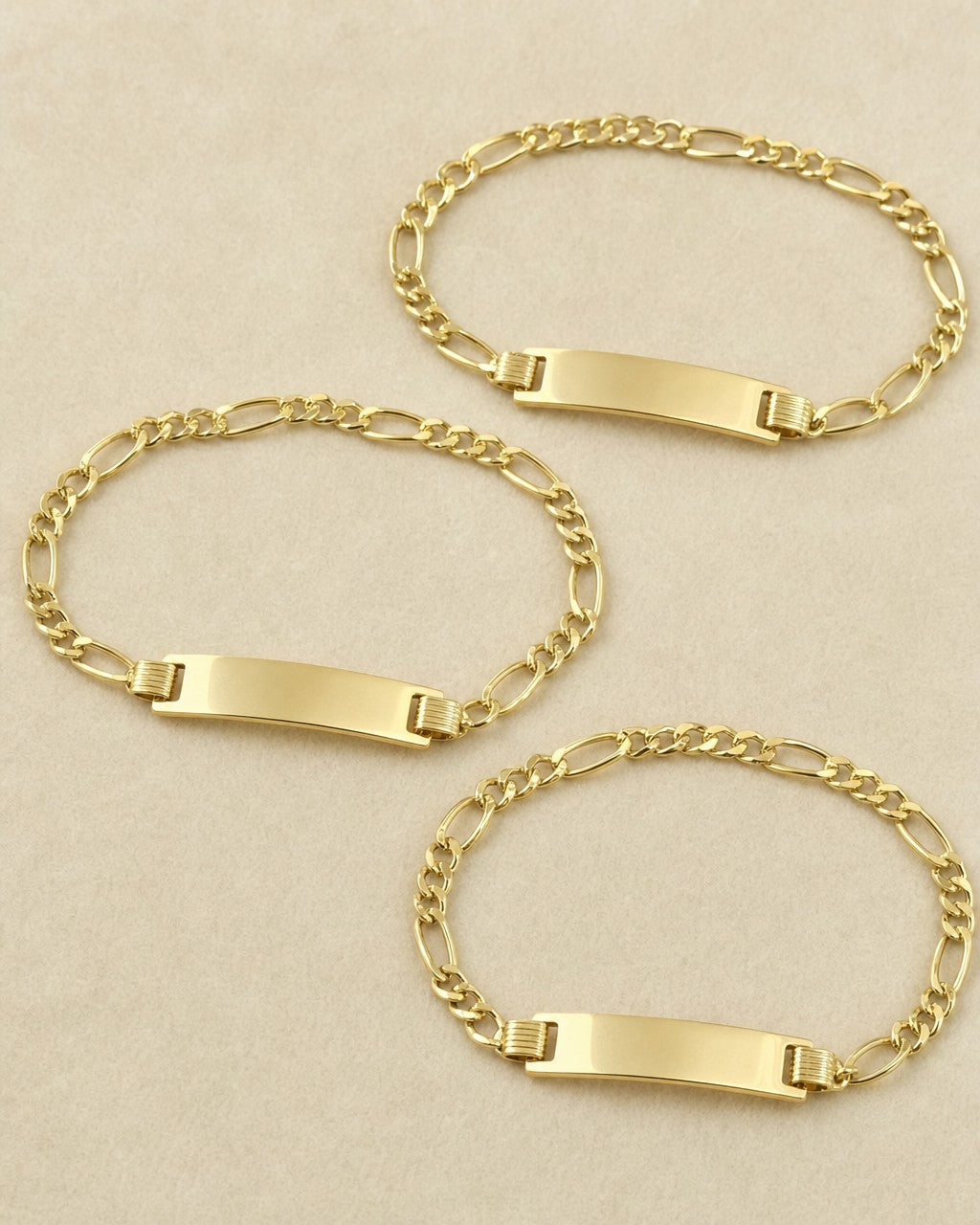10K Custom Name Plate Figaro Link Baby Bracelet styled photo
