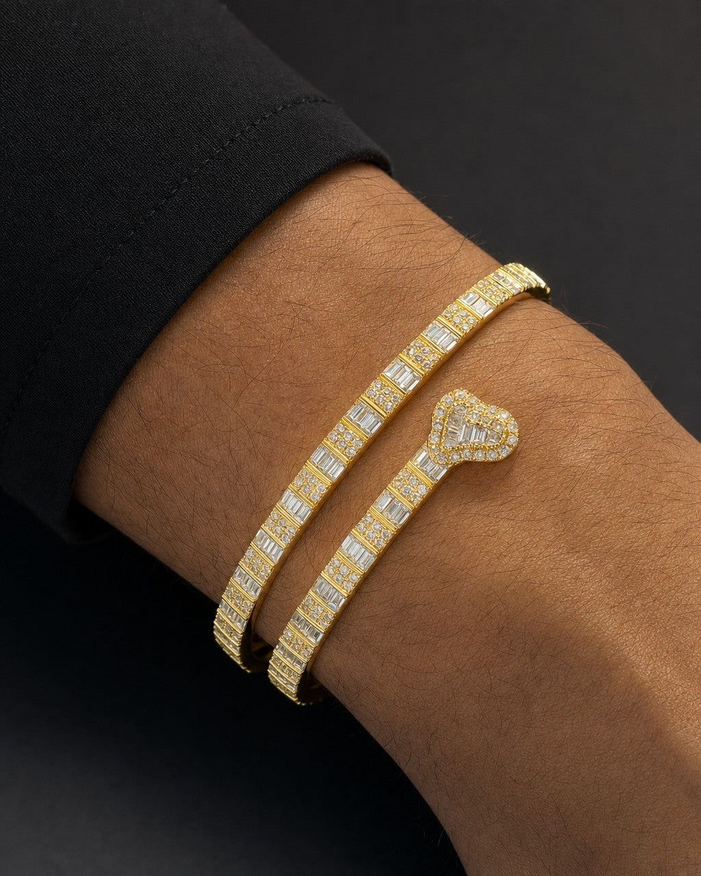 Male model wearing 10K/14K Heart Diamond Baguette Bangle Bracelet