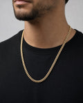 Male model wearing 14K 4MM Cuban Link Diamond Chain 16-22"