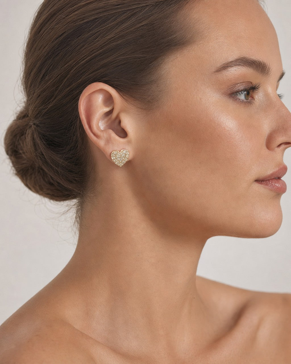 Female model wearing 14K Classic Heart Diamond Earrings