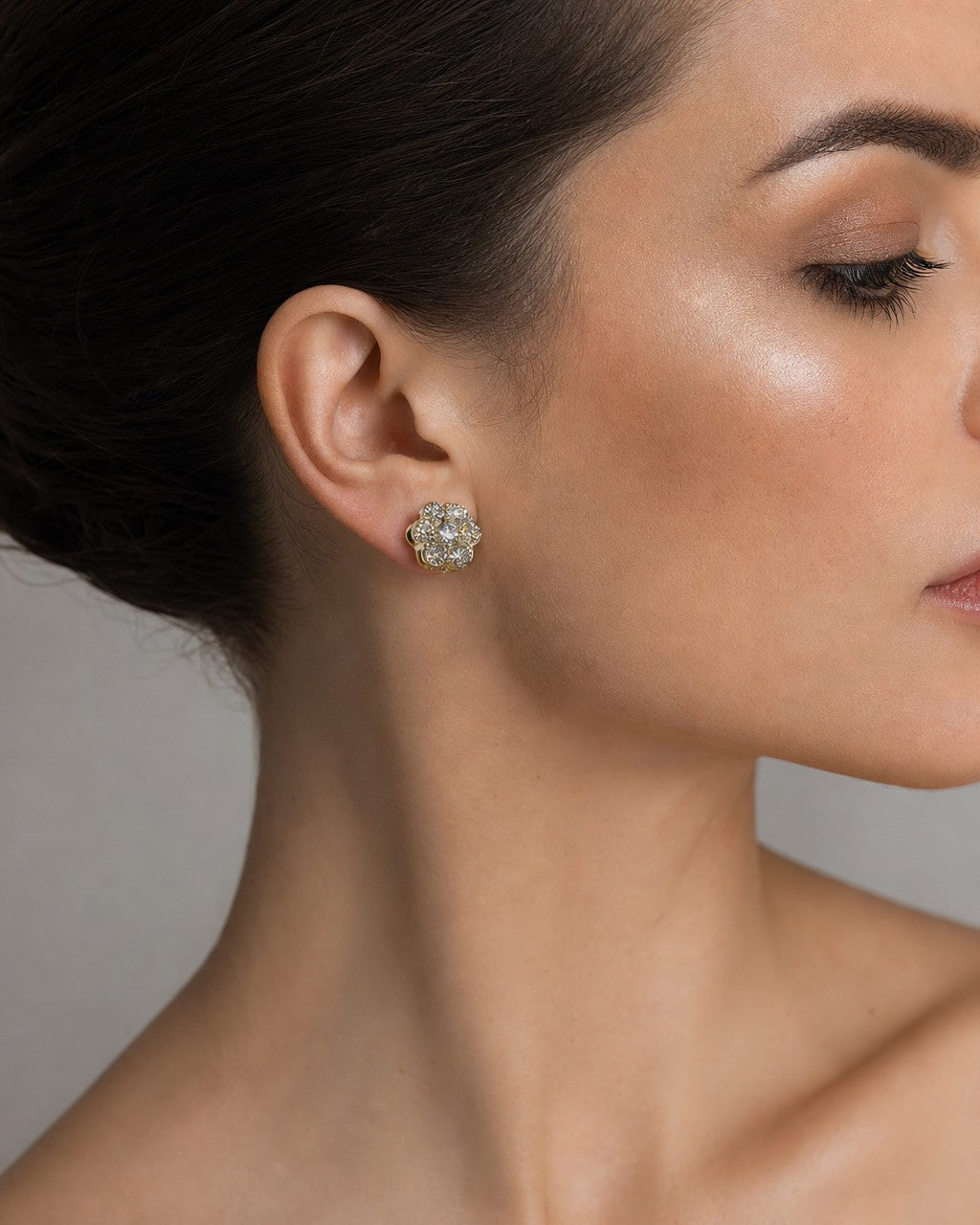 Female model wearing 14K Flower Earrings All Sizes
