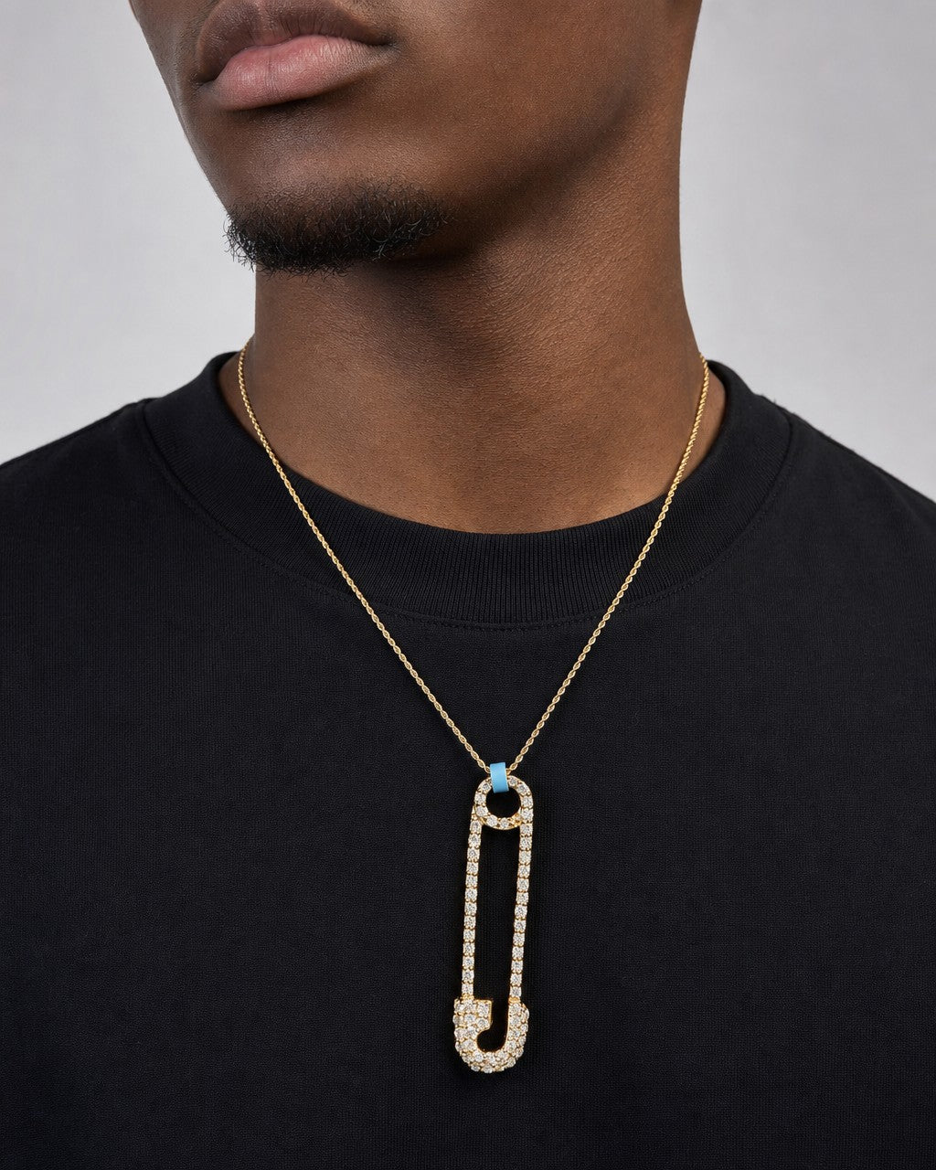 Male model wearing 14K Iced Paper clip Pendant