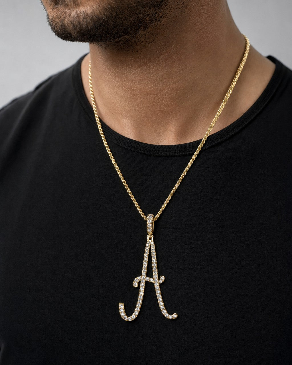 Male model wearing 14K Jumbo Script Initial Letter Diamond Pendants Full Collection
