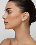 Female model wearing 14K Square Box Diamond Baguette Earrings