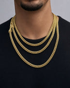 Male model wearing Miami Cuban Link Chain Real 10K Yellow Gold Full Collection