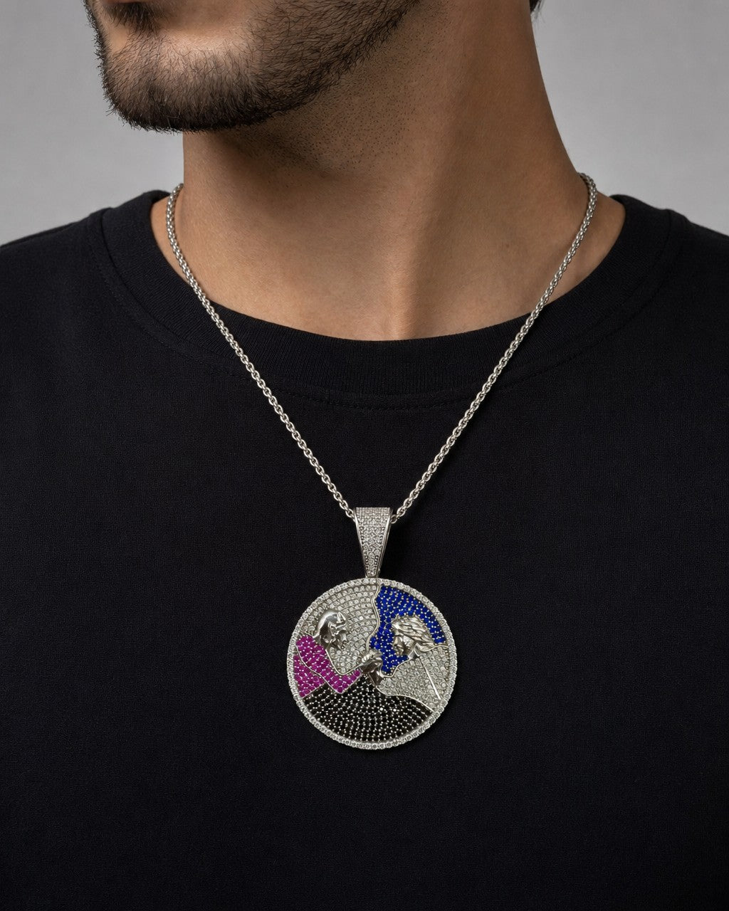 Male model wearing 14k Custom Battle Pendant