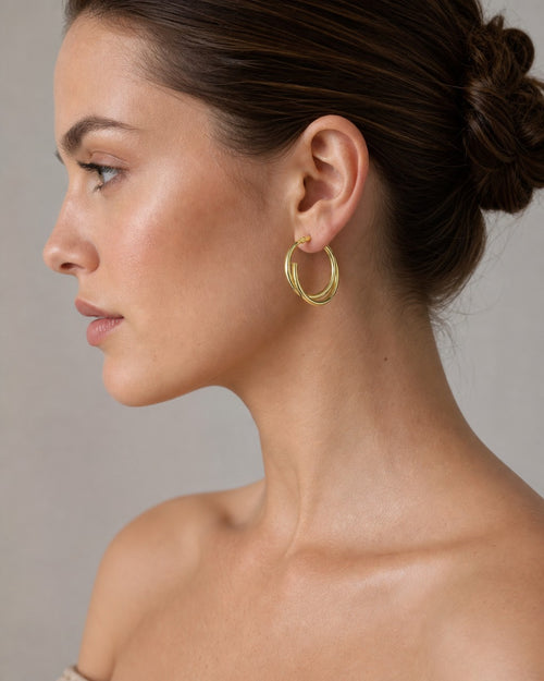 Model wearing 10K 3.2MM Yellow Gold Hoop Earrings